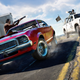 Two people shoot guns at each other from cars in Far Cry 5.